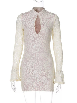White lace cutout mini dress with flared sleeves and high neckline.