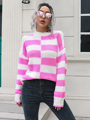 Dreamweave Drape Sweater in Fuchsia Pink and white checkerboard stripe acrylic knit with crewneck and long sleeves.