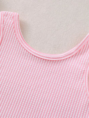 Pink striped seersucker one-piece swimsuit with ruffled trim.