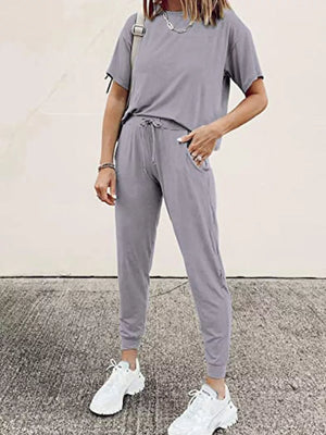 Grey cotton round neck top and jogger pants set with drawstring waist and pockets.