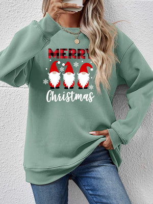 Sage green sweatshirt with a Christmas gnome graphic and plaid Merry text.