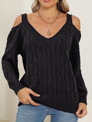 Black cable knit cold shoulder sweater with V-neck and balloon sleeves.