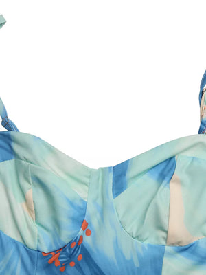 Floral sweetheart midi dress with spaghetti straps in aqua and blue tie-dye print.