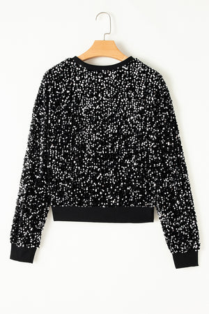 Black sequin embellished sweatshirt with ribbed cuffs and hem