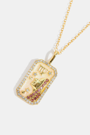 Virgo zodiac sign crystal pendant necklace with gold plating and pink and clear rhinestones.