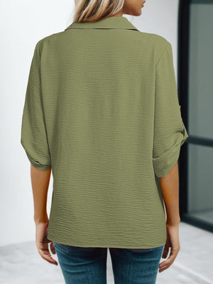 Army green crinkled texture Johnny collar shirt with rolled sleeves.