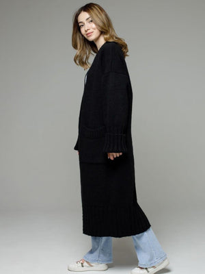 Black oversized ribbed-trim maxi cardigan with pockets and wide cuffs.