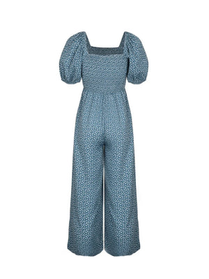 Smocked bodice floral wide-leg jumpsuit in Dusty Blue with puff sleeves and square neckline.