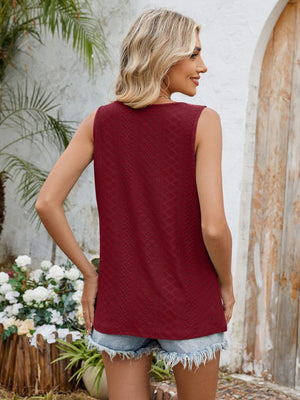 Burgundy perforated keyhole tank top with a textured pattern.