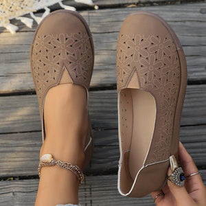 Coffee floral cutout slip-on loafers with breathable design and comfortable fit.