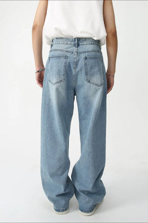 Painted Script baggy jeans in medium wash denim with a relaxed fit.