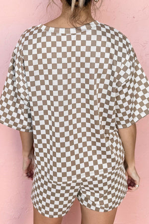 Checkered loungewear set in khaki and white, featuring a short-sleeve top and shorts.
