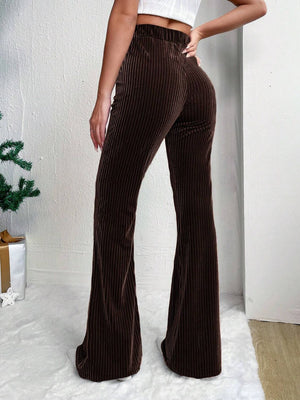 Chocolate corduroy bell bottom trousers with vertical texture.
