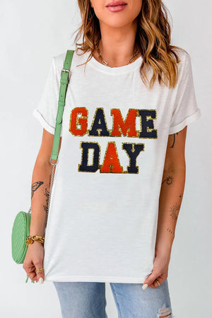 White t-shirt with sequin-trimmed Game Day graphic, crew neck, short sleeves.