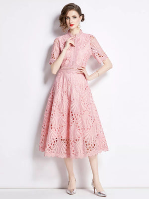 Pink lace midi dress with delicate sleeves and a-line skirt.