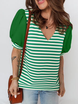 Striped v-neck sweater with green puff sleeves and a textured knit.
