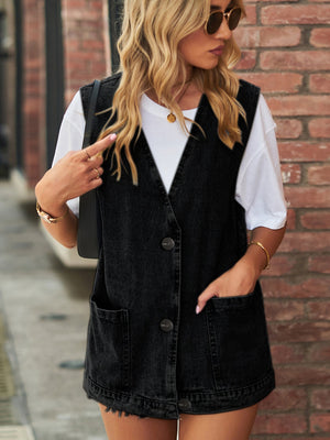 Black oversized denim vest with patch pockets and button front.