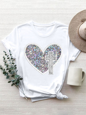 White t-shirt with iridescent heart and cross appliqué detail