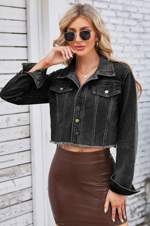 Black washed denim bolero jacket with raw hem and button front.