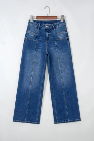 Seam-detail high-waisted wide-leg jeans in blue denim with front seam detailing.