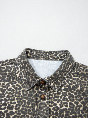Denim leopard print shirt with button front and collar.