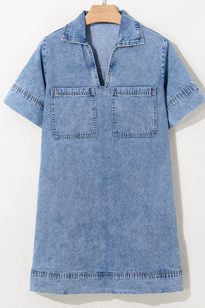Light blue denim mini dress with collar, V-neck, short sleeves, and two chest pockets.