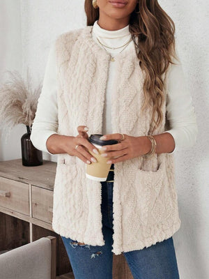 Textured sherpa open-front vest in dust storm with pockets.