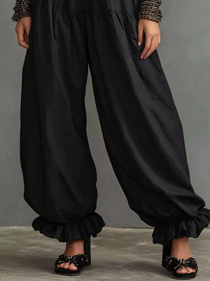 Full Size Smocked Ruffle Hem Wide Leg Pants in Mustard, side view