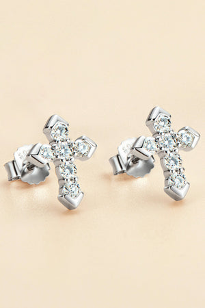 Silver diamond-set geometric cross stud earrings with sparkling stones.