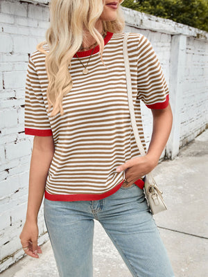 Striped knit tee with red trim and crew neck, paired with light wash jeans.