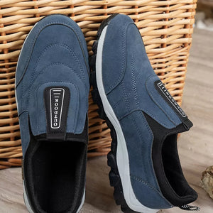 Blue suede-like round toe slip-on sneakers with "OUTDOOR" detail.