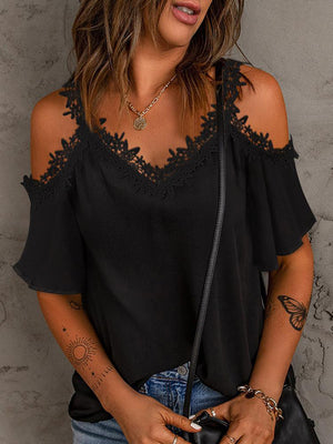 Black cold-shoulder flutter sleeve blouse with lace trim neckline