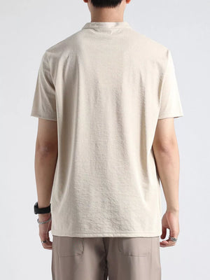 Men's short sleeve henley t-shirt in Caramel Color with band collar and button detail.