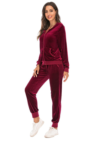 Velvet loungewear set in Wine, with zip-up hoodie and drawstring pants.