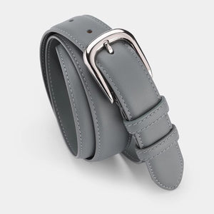Timeless cowhide leather slim belt in blue gray with silver buckle and contrast stitching.
