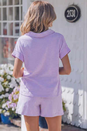 Chic striped cotton polo and drawstring shorts set for women.