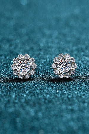 Floral halo stud earrings in 925 sterling silver with brilliant cut stones.
