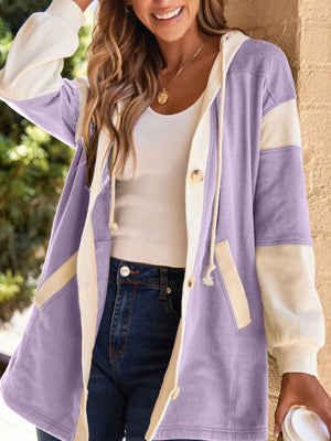 Color block waffle knit oversized sweatshirt with button front and cream waffle sleeves.
