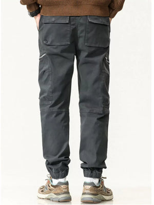 Men's dark gray casual cargo pants with zipper pockets and multiple utility pockets.