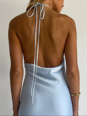 Light blue satin halter maxi dress with open back and tie detail