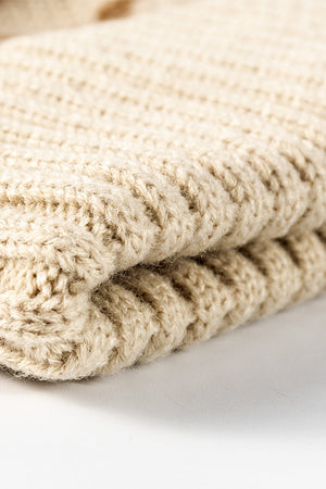 Beige acrylic beanie with textured knit pattern and folded brim