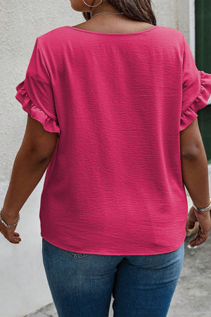 Hot pink textured blouse with ruffle short sleeves, crew neck, and relaxed fit.