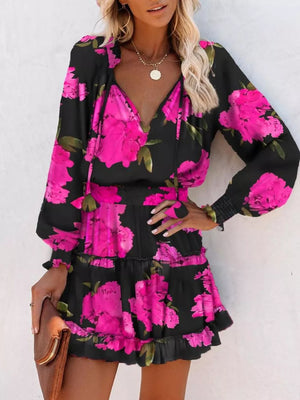Black floral print tiered mini dress with ruffles and tie neck