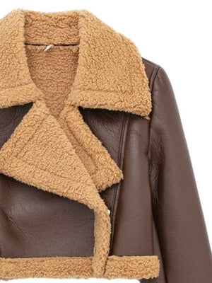 Brown cropped aviator jacket with shearling trim and collar detail.