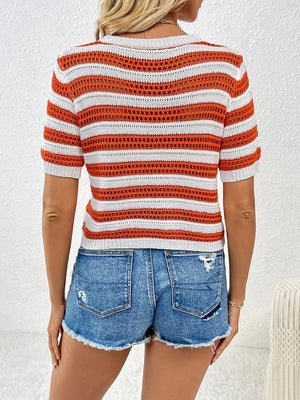 Open-knit striped crew neck top in orange and white with short sleeves.