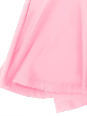 Pink ruffled hem dress detail showing layered fabric and stitching.