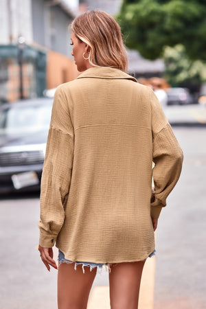 Caramel textured gauze overshirt with relaxed silhouette and button cuff sleeves.