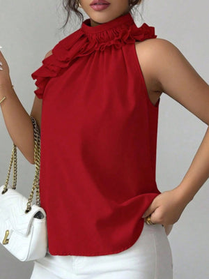 Ruffled high neck sleeveless blouse in red, black, apricot, or brown.