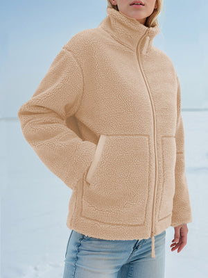 Tan sherpa stand-collar jacket with zip front and pockets