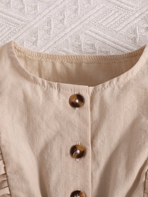 Apricot baby set with button front and ruffle trim detail.